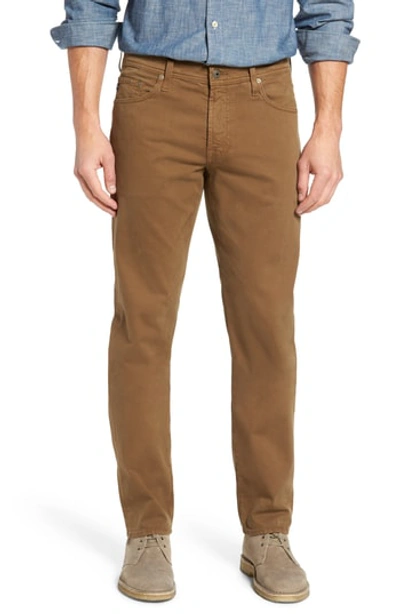 Ag Jeans Graduate New Tapered Slim Straight Fit Pants In Rustic Brass