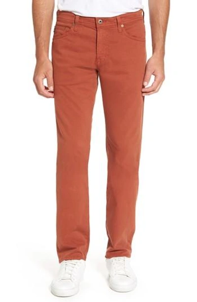 Ag Graduate Sud Slim Straight Leg Pants In Burnt Cumin