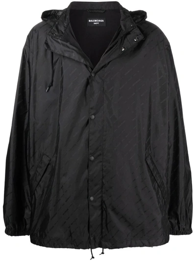 Balenciaga Snap Button Front Hidden Hood Allover Logo Rain Jacket In Black