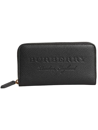 Burberry Embossed Leather Ziparound Wallet In Black