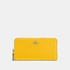 Coach Accordion Zip Wallet In Sv/yellow
