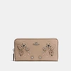 Coach Accordion Zip Wallet With Tea Rose Tooling In Stone/light Antique Nickel