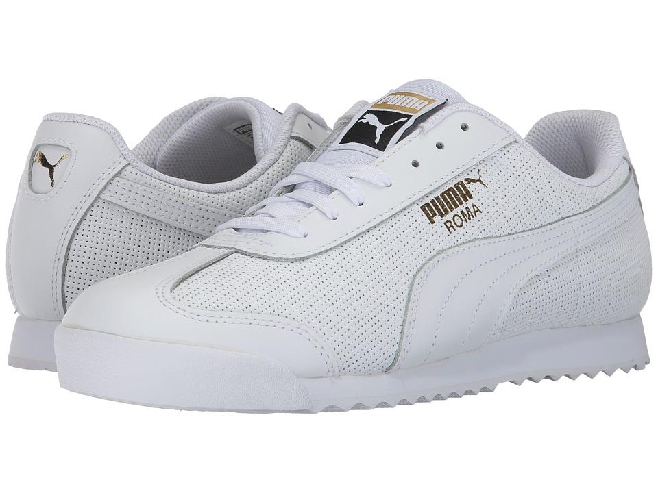 gold and white puma sneakers