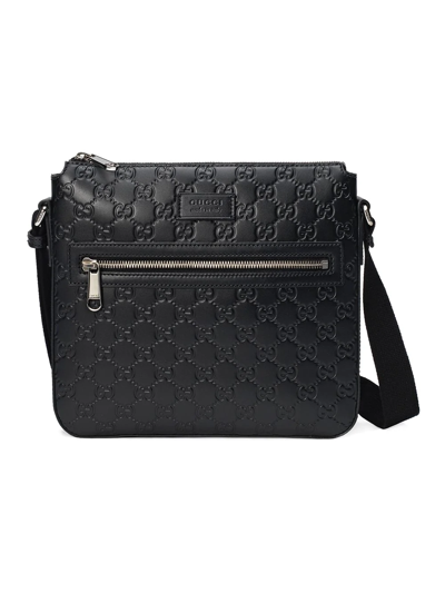 Gucci Signature Embossed Messenger Bag In Black