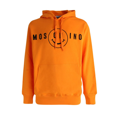 Moschino Logo Printed Drawstring Hoodie In Orange