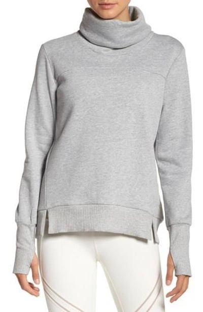 Blonde Woman Wearing Alo Grey Funnel Neck Sweatshirt Alo Black