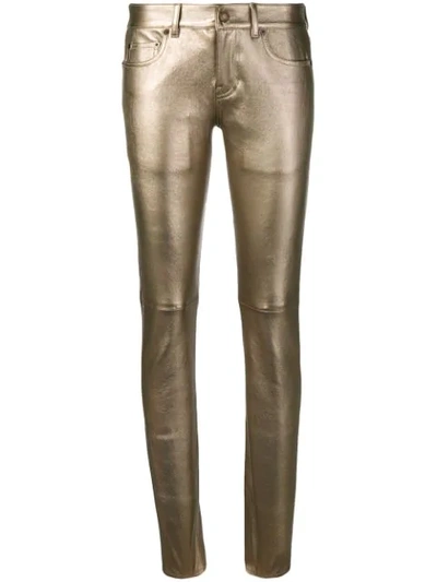 Saint Laurent High-rise Skinny Metallic Jeans In Oro