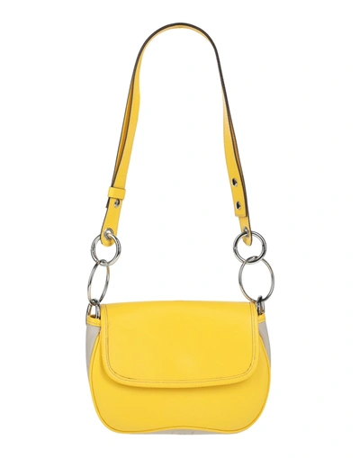 I Oe F Handbags In Yellow