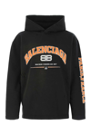 Balenciaga Distressed Printed Cotton-jersey Hoodie In Black