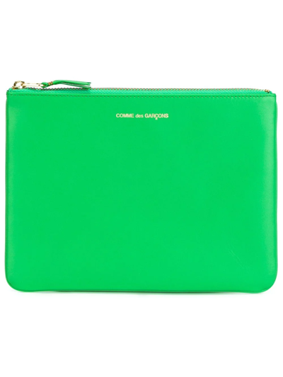 Comme Des Garçons Logo Print Leather Clutch In Green