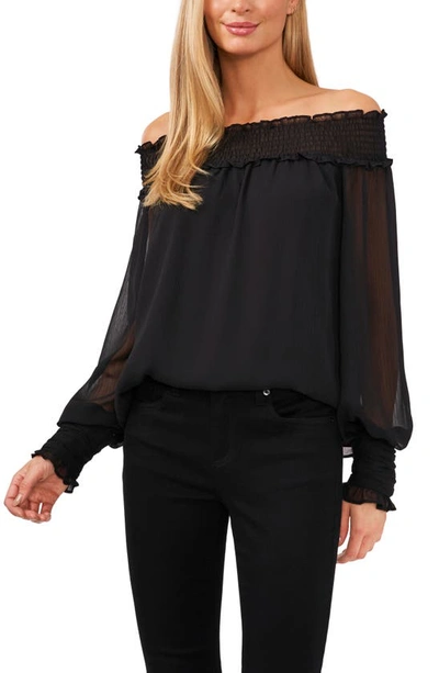 Shop Cece Off The Shoulder Smocked Blouse In Rich Black