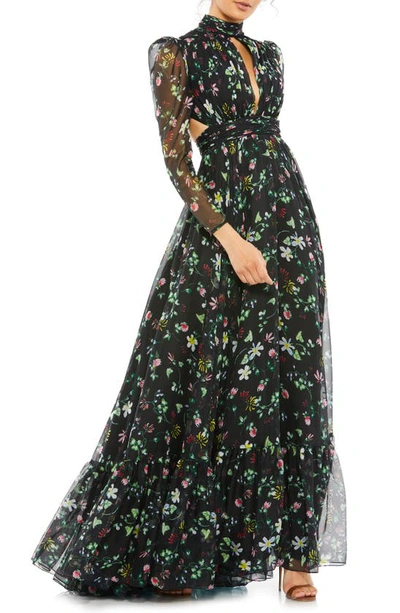 Mac Duggal Long Sleeve High Neck Chiffon Floral Gown In Black Floral