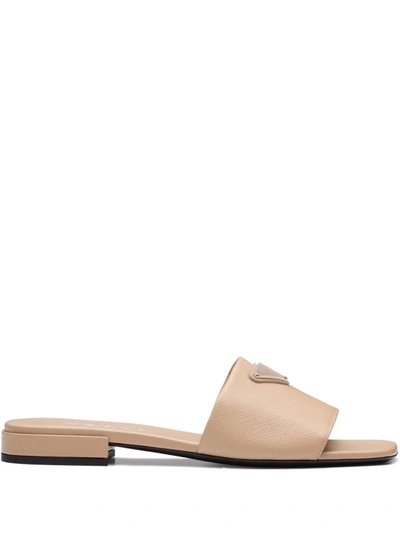 Prada Calfskin Logo Flat Slide Sandals In Beige