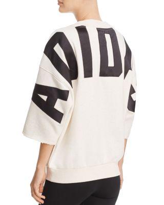 cream adidas sweatshirt