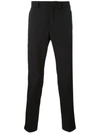 Prada Techno Stretch Slim Fit Trousers In Black