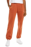 Nike Sportswear Essential Fleece Pants In Burnt Sunrise/ White