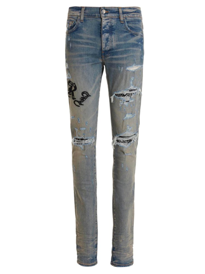 Amiri Old English-logo Distressed Skinny Jeans In Blue