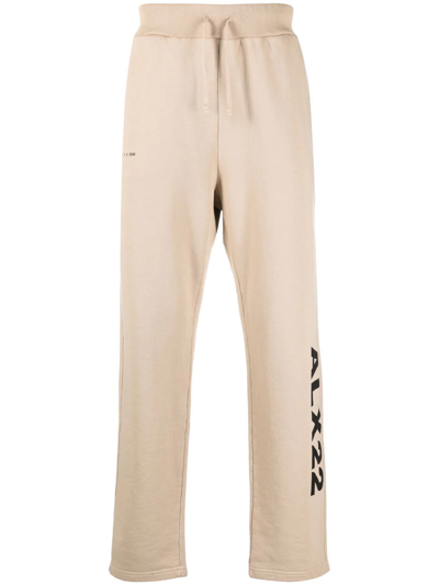 Alyx Logo-print Relaxed-fit Tapered Cotton-jersey Jogging Bottoms In Beige,black