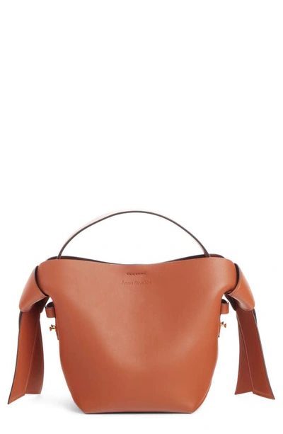 Acne Studios Mini Musubi Leather Top Handle Bag In Almond Brown