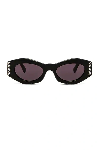 Alaïa Oeillet Uregular Shape Sunglasses In 001 Shiny Black