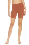 Alo Yoga High Waist Biker Shorts In Rust