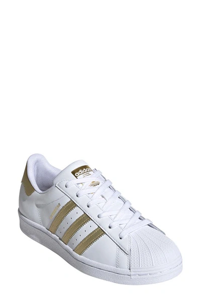 Adidas Originals Superstar Sneaker In White/ Gold Met/ White