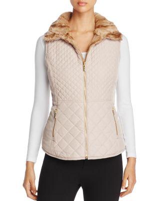 calvin klein faux fur vests