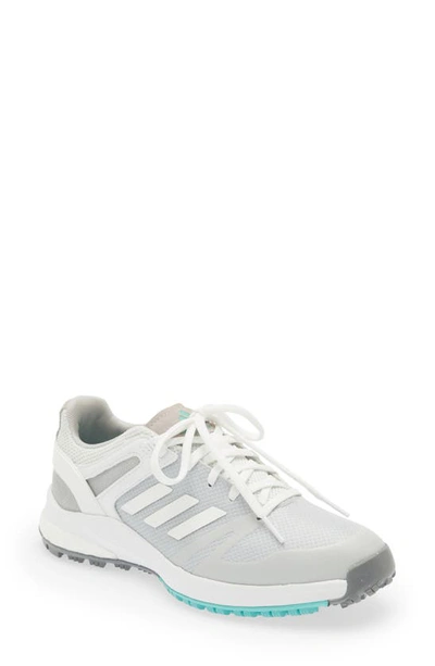 Adidas Golf Eqt Spikeless Water Repellent Golf Shoe In White/white/acid Mint