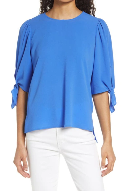 Cece Tie Sleeve High-low Blouse In Blue