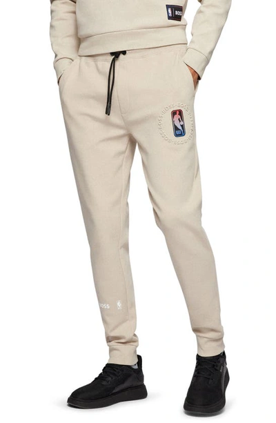 Shop Hugo Boss Slamdunk2 3 Embossed Sweatpants In Light Beige Nba