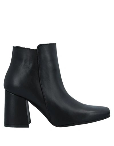 Divine Follie Ankle Boots In Black