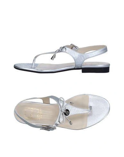 Bruno Magli Flip Flops In Silver