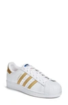 Adidas Originals Superstar Sneaker In White/ Gold
