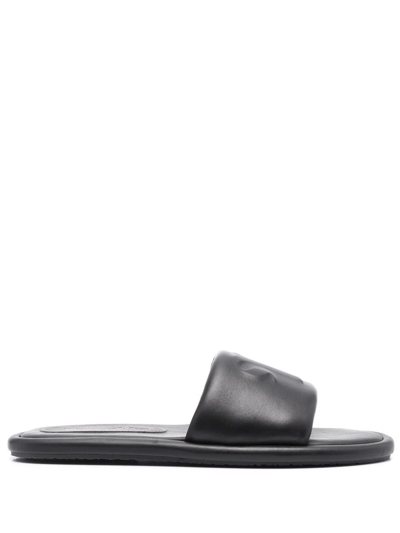 Nanushka Logo-embossed Leather Sandals In Black