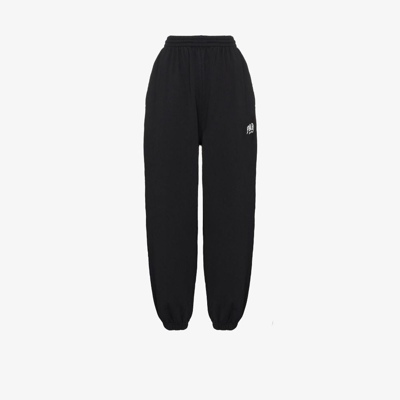 Balenciaga Paris Distressed Embroidered Organic Cotton-jersey Track Trousers In Black