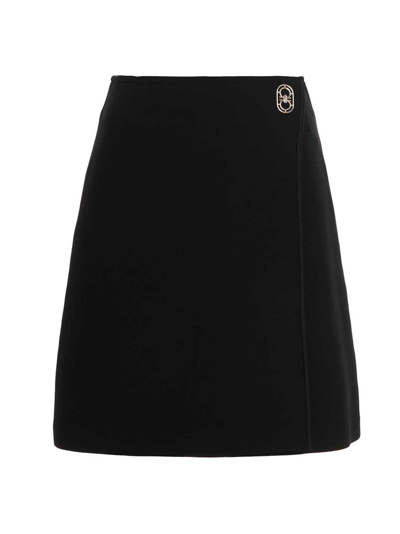 Ferragamo Logo-plaque Wrap Mini Skirt In Schwarz
