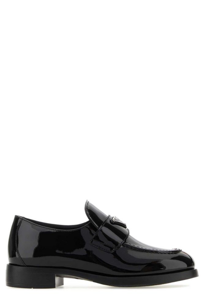 Prada Spazzolato Logo Leather Loafers In Black