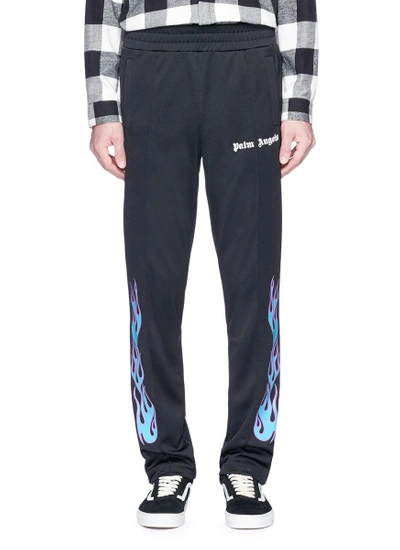 Sweatpants with flame print Palm Angels
