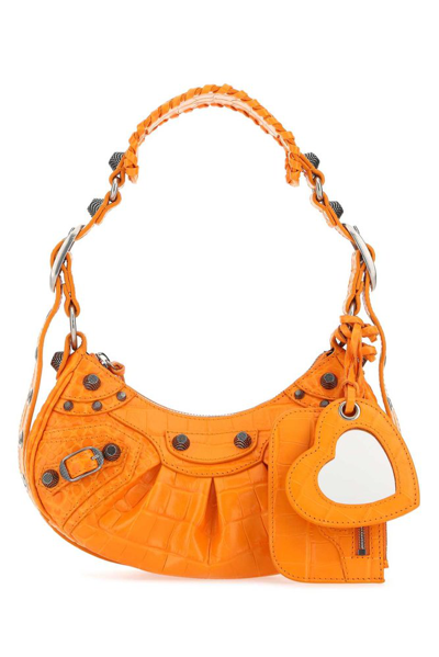 Balenciaga Le Cagole Xs Embossed Shoulder Bag In Orange