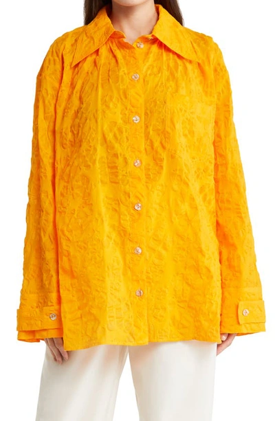 Nanushka Leora Monogram Button-front Shirt In Orange Monogram