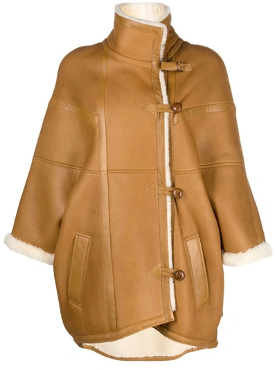 Saint Laurent Oversized Leather Cape With Shearling Lining In Brown