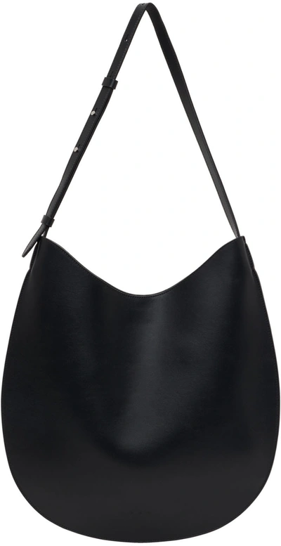 Aesther Ekme Black Leather Flat Shoulder Bag In 101 Black