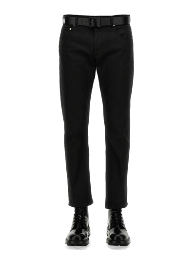 Alexander Mcqueen Jeans With Logo Embroidery In Black
