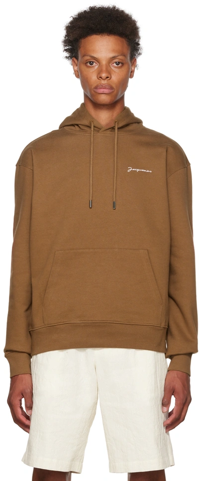 Jacquemus Embroidered-logo Organic Cotton Hoodie In Brown