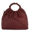 The Row Circle Leather Cross-body Bag In Deep Rouge Pebbled