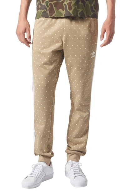 Adidas Originals Adidas Men's Pharrell Williams Printed Track Pants In Hemp  | ModeSens