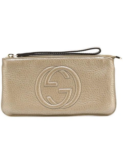 Gucci Gg Embossed Pouch In Metallic