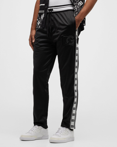 Dolce & Gabbana Embossed Logo Tape Sweatpants In Nero