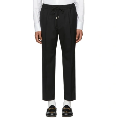 Gucci Tapered-leg Mid Rise Wool Track Pants In Black