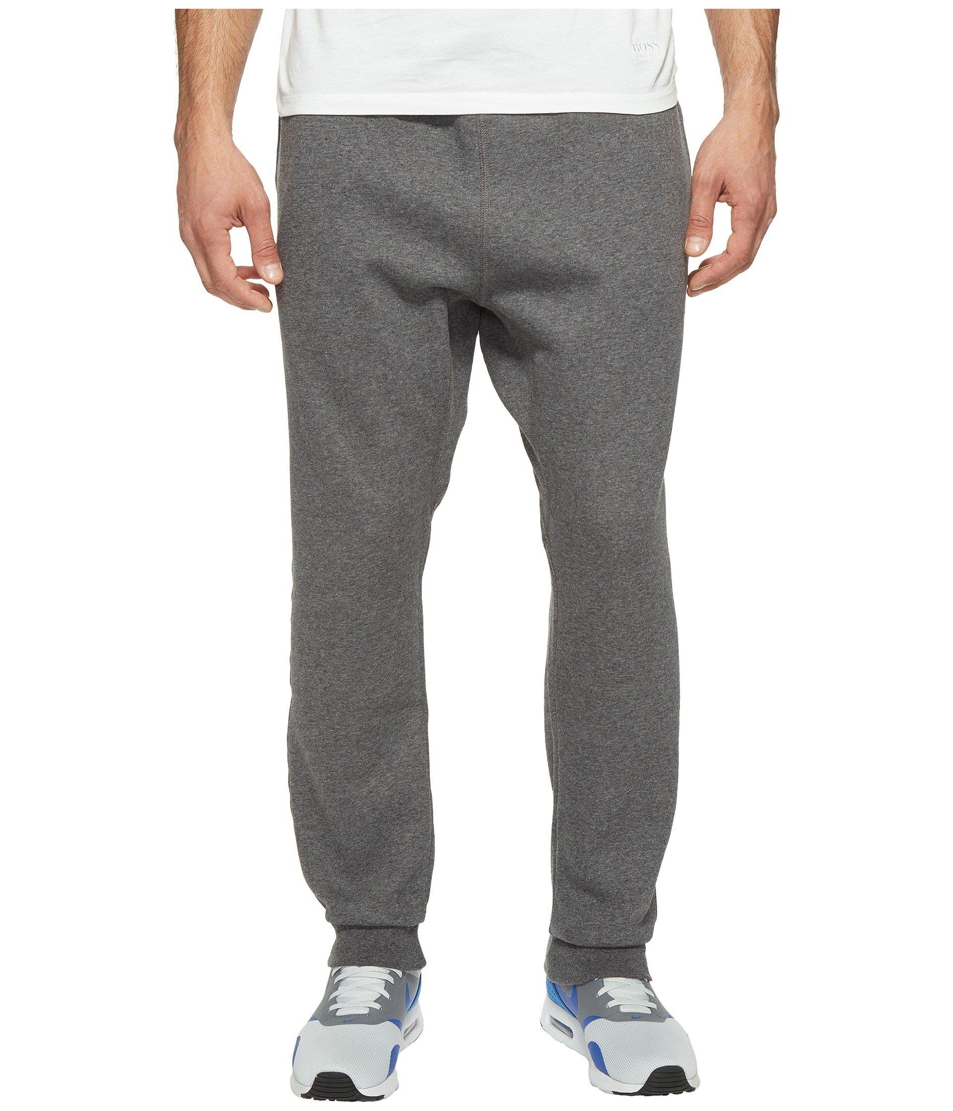 Nike Club Fleece Taper Cuff Pant In Charcoal Heather/white | ModeSens